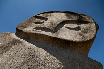 Palindo megalith, from unknown prehistoric megalithic cultures, is located in the Bada Valley,...