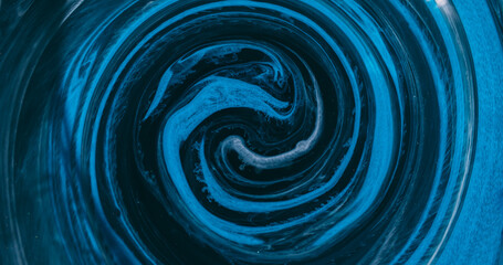 Paint whirl. Smoke swirl background. Defocused blue color glitter sparkling round liquid texture floating on acrylic art abstraction.