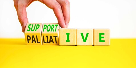 Palliative or supportive therapy symbol. Concept words Palliative to Supportive on beautiful wooden...