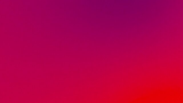 Gradient background with shades of red orange and pink creating a smooth and vibrant color transition