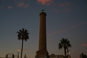 lighthouse in Chipiona in Andalusia in warm blue light after sunset