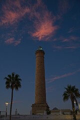 lighthouse in Chipiona in Andalusia in warm blue light after sunset