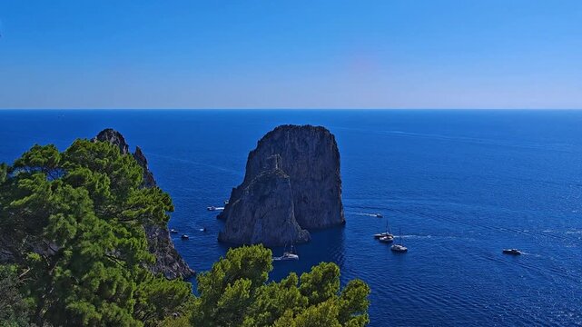 Stunning View of Faraglioni Rocks and Deep Blue Tyrrhenian Sea from Capri Island, Italy