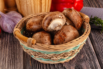 Raw brown champignon heap for cooking