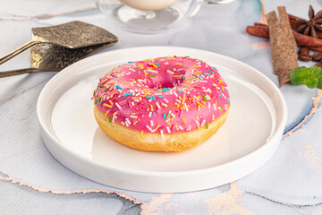 Sweet donut with strawberry icing