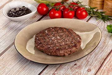 Grilled juicy beef cutlet for burger
