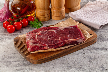 Gourmet raw rib eye steak