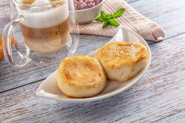 Fried homemade cottage cheese syrniki