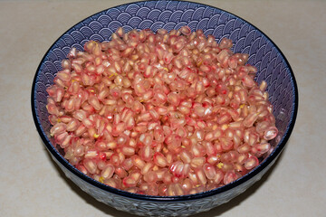 Pomegranate Seeds in a Large Bowl