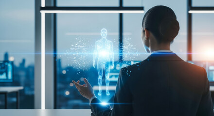 A professional asian female in an office interacts with a digital hologram of a human figure, symbolizing advanced technology and innovation in a business environment.