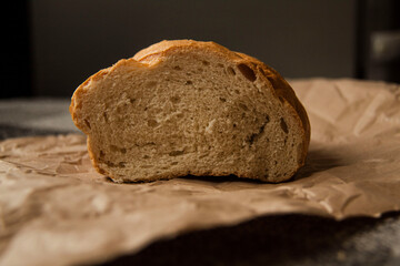 Rustic Bread on Brown Paper Background