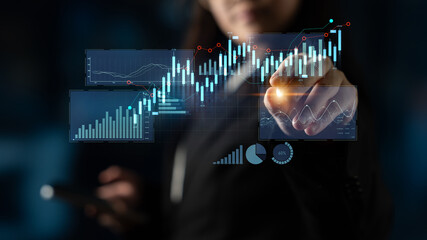 A businessman engages with a futuristic data interface, showcasing financial growth and analytics through interactive charts and modern technology in a corporate environment. Scalp
