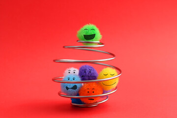 Plush sphere happy moves forward and breaks free while the group is still trapped