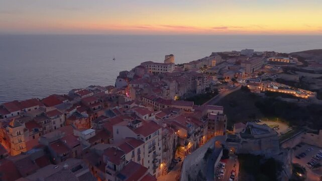 charming seaside sunset, peaceful seaside settlement at dusk with historic structures and dreamy. Bonifacio. France