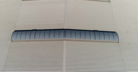 Metal Roof Skylight Panels for industrial Factory building. Construction of industrial and commercial buildings. Commercial Metal Roofing. Industrial Metal Roof. Skylight Roofing. Outside. Top view. - Powered by Adobe