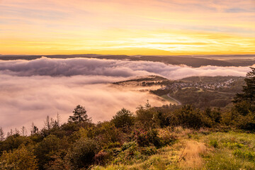 Sunrise over the Rhine River near Bad Salzig highlights the beauty of morning mist in Germany
