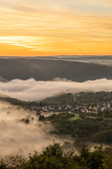 Sunrise over the Rhine River near Bad Salzig in Germany with mist covering the valley