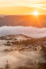 Sunrise over the Rhine River near Bad Salzig reveals misty valleys and scenic beauty in Germany