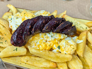 Sabadiego, a typical sausage from the municipality of Noreña, fried with potatoes and egg, Asturias, Spain
