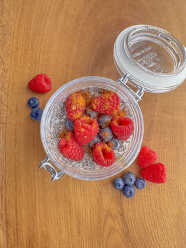 Overnight Oats with Fresh Berries, Healthy Breakfast in Natural Light