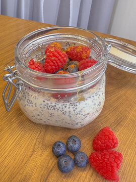 Overnight Oats with Fresh Berries, Healthy Breakfast in Natural Light