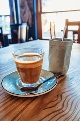 Latte in Glass with Soft Café Lighting