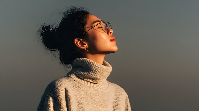 Woman enjoying the sunlight with glasses and a sweater isolated girl AI Generated