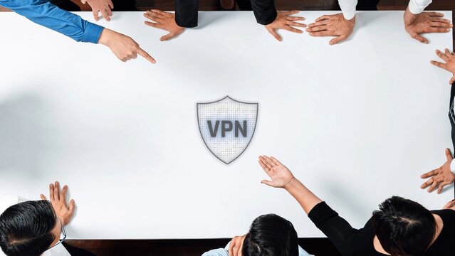 A diverse group of individuals gathered around a white table, passionately discussing secure internet connections, emphasizing the importance of VPN for privacy and safety. Raster