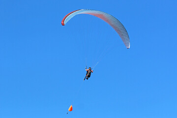 Paraglider being towed by a winch