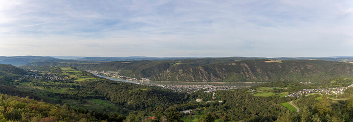 Scenic view of Rhine River near Bad Salzig showcasing lush landscapes and serene waters
