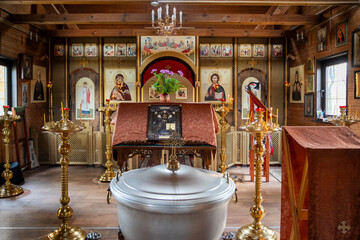 Intricate Church Interior with Iconography and Candles