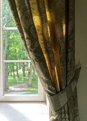 Sunlight through the window curtain