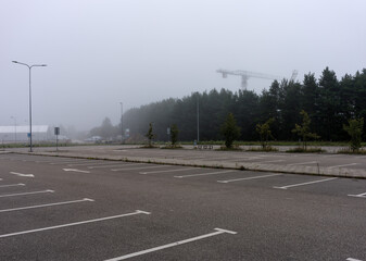 Empty parking lot in fog