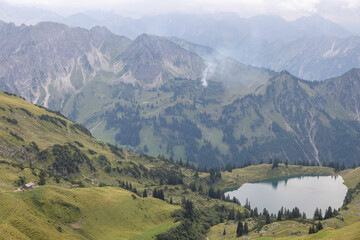 Stunning lake view at Nebelhorn mountain and surrounding landscapes in the German Alps
