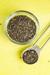 Chia Seeds on Yellow Background