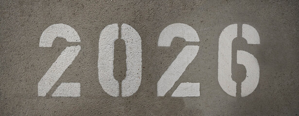 2026 number written on the concrete floor.          