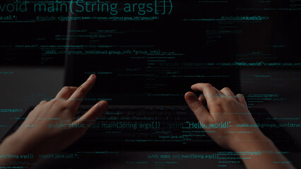 Hands are seen typing on a laptop in a dark environment, with lines of code displayed on the screen. This image captures the essence of programming and modern technology. Xenic