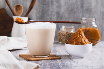 Asian miso sweet salty coffee in a glass on the table