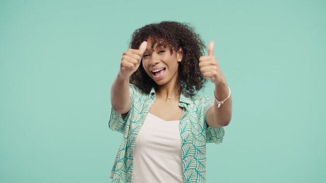 Positive African Woman With Hand Sign Like, Thumbs Up Gesture.schoolgirl On Blue