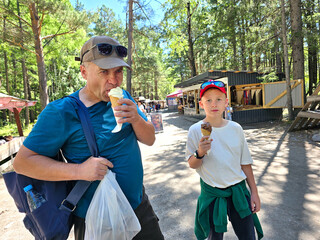 Man And Boy Eating Ice Cream Family Vacation Concept