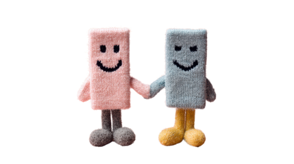 Two cute soft toy characters holding hands, pink and blue plush figures with smiling faces, symbolizing friendship, love, and togetherness