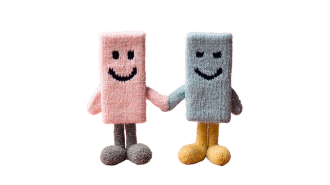 Two cute soft toy characters holding hands, pink and blue plush figures with smiling faces, symbolizing friendship, love, and togetherness