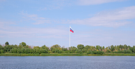 Russian flag on the banks of the Volga.