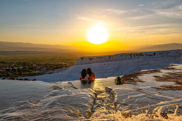 The thermal waterfalls of Pamukkale at sunset