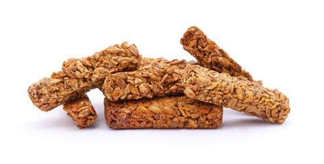 Crunchy granola bars made of oats and seeds on white background.