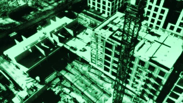 Simulated night vision drone footage of an urban cityscape with rooftop details, presented in a green LED screen effect for a tactical or reconnaissance visual style.