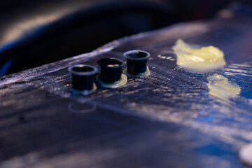 Tattoo ink cups arranged on work surface