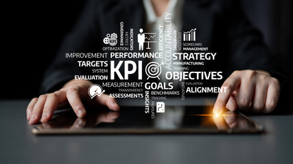 A business professional interacts with a digital tablet, focusing on key performance indicators for strategic evaluation and performance enhancement within a corporate environment. Tessel