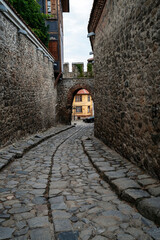 Hisar Kapia Gate and Cobblestone Alley with Cat in Plovdiv Old Town