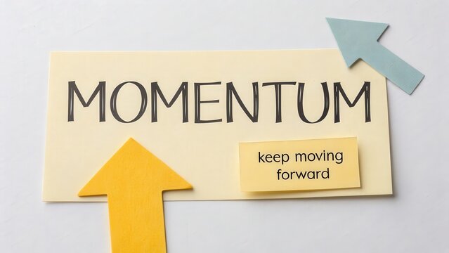 Motivational concept flat lay with the word Momentum and a note that says keep moving forward alongside upward pointing paper arrows